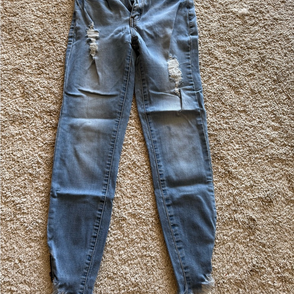 Distressed Blue Denim Jeans